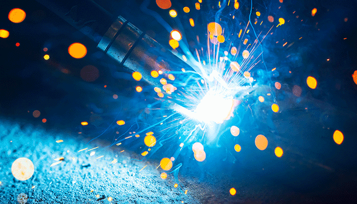On-torch welding fume extraction